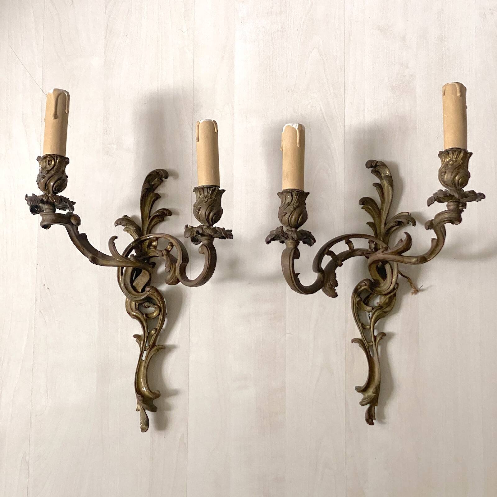 Pair of bronze wall sconces in Louis XV style