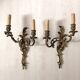 Pair of bronze wall sconces in Louis XV style