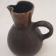 Artisanal jug with flamed interior