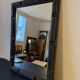 Patinated black rectangular wooden mirror