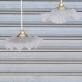 Pair of polished glass pendant lights