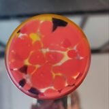 Curved vase made of glass paste