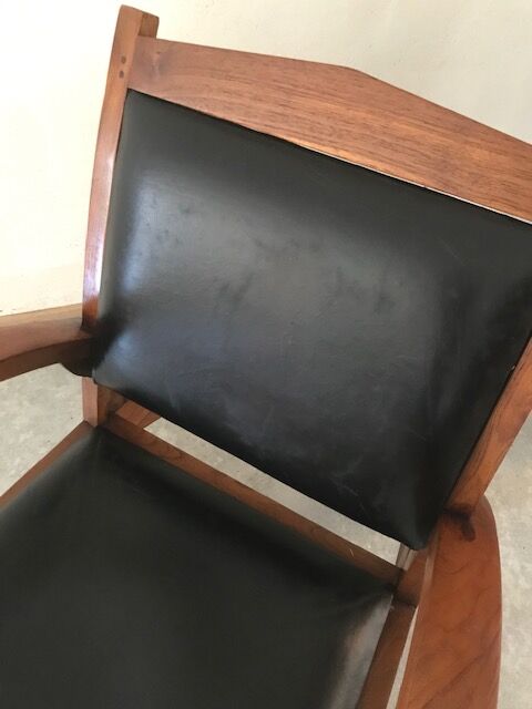 Teak armchair and black leather