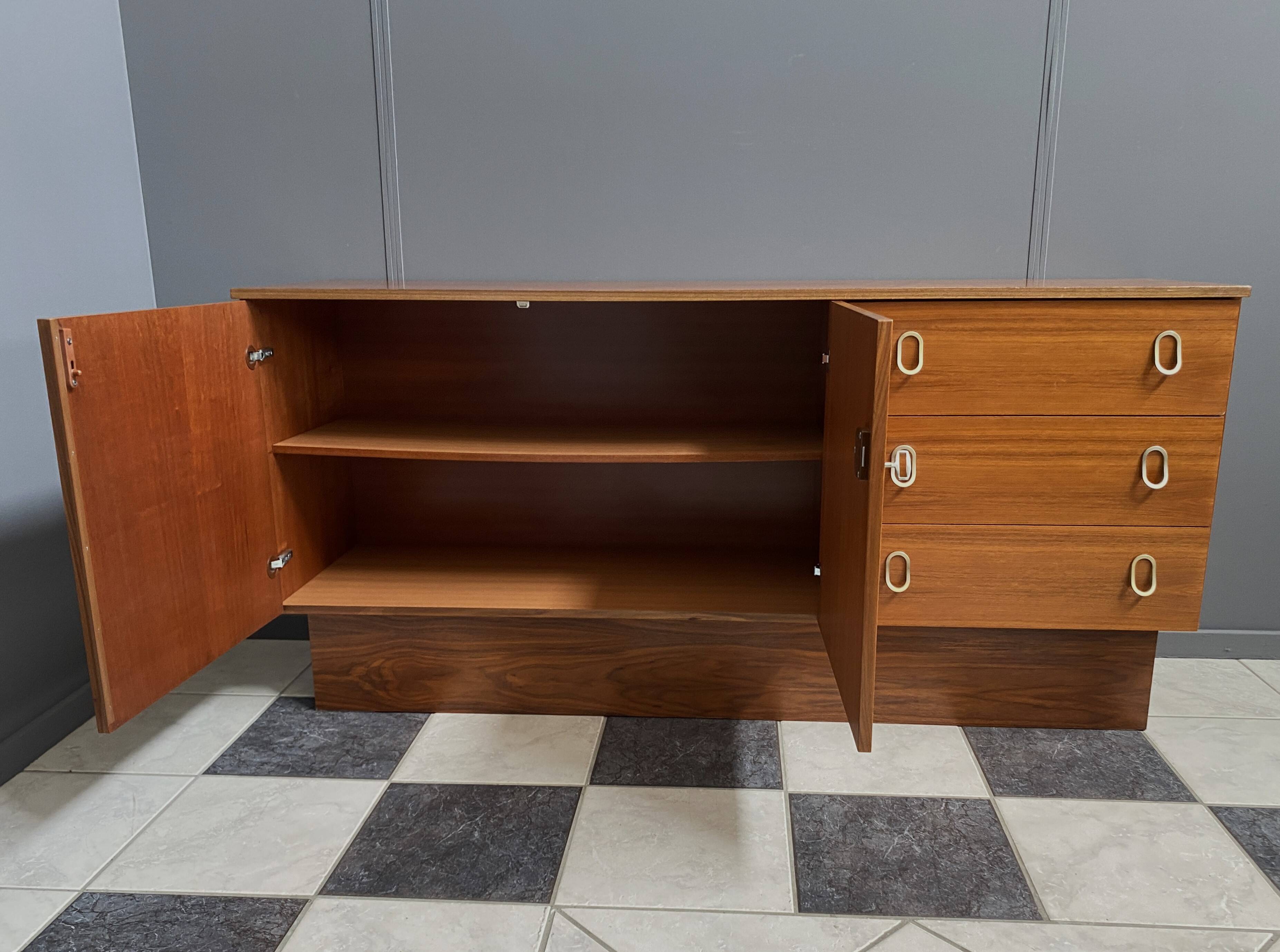 Sideboard brass grips on the drawers 1970s palisander