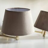articulated brass and velvet wall light