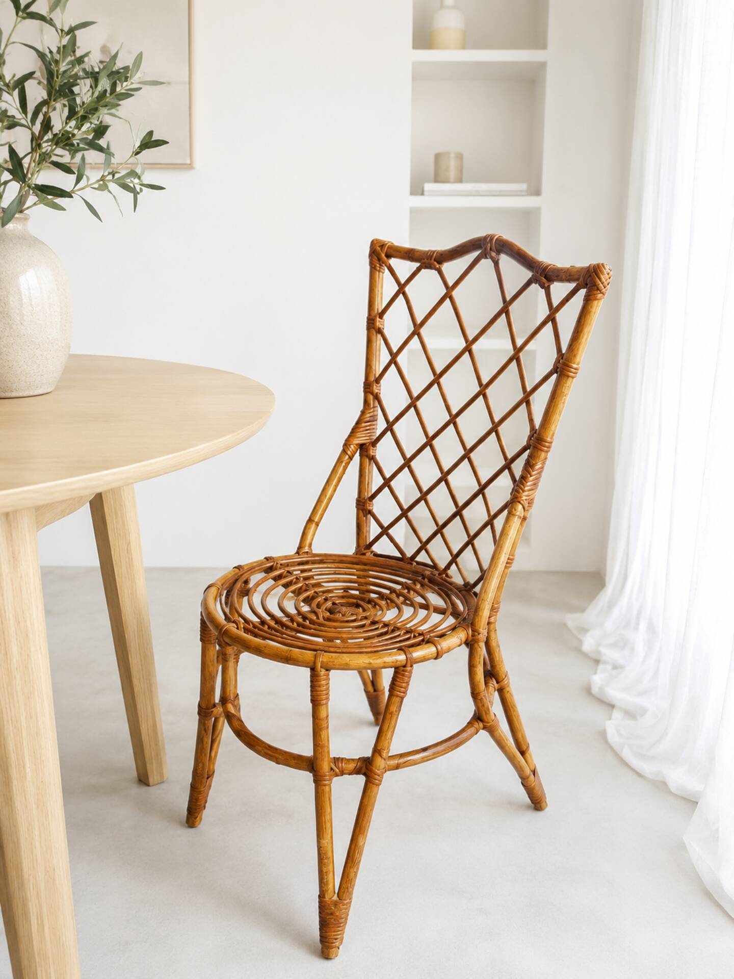 Vintage rattan chair – Louis Sognot style
