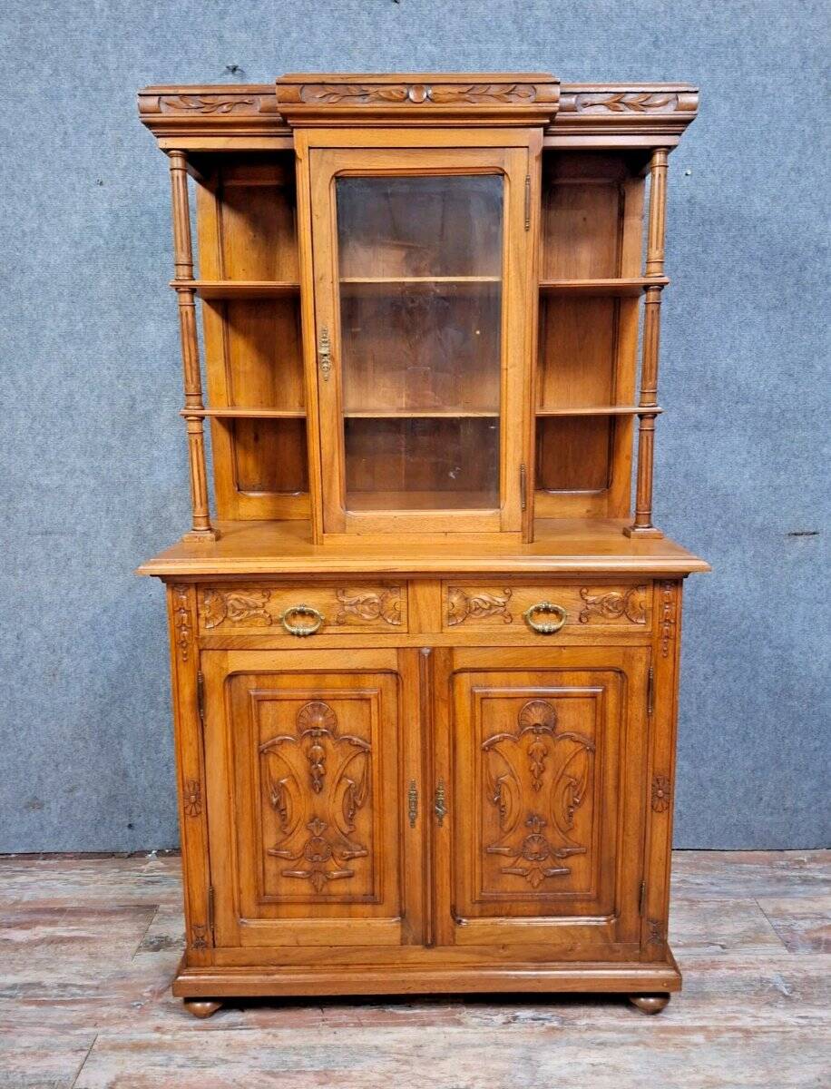 charming and characterful antique walnut two-body buffet.