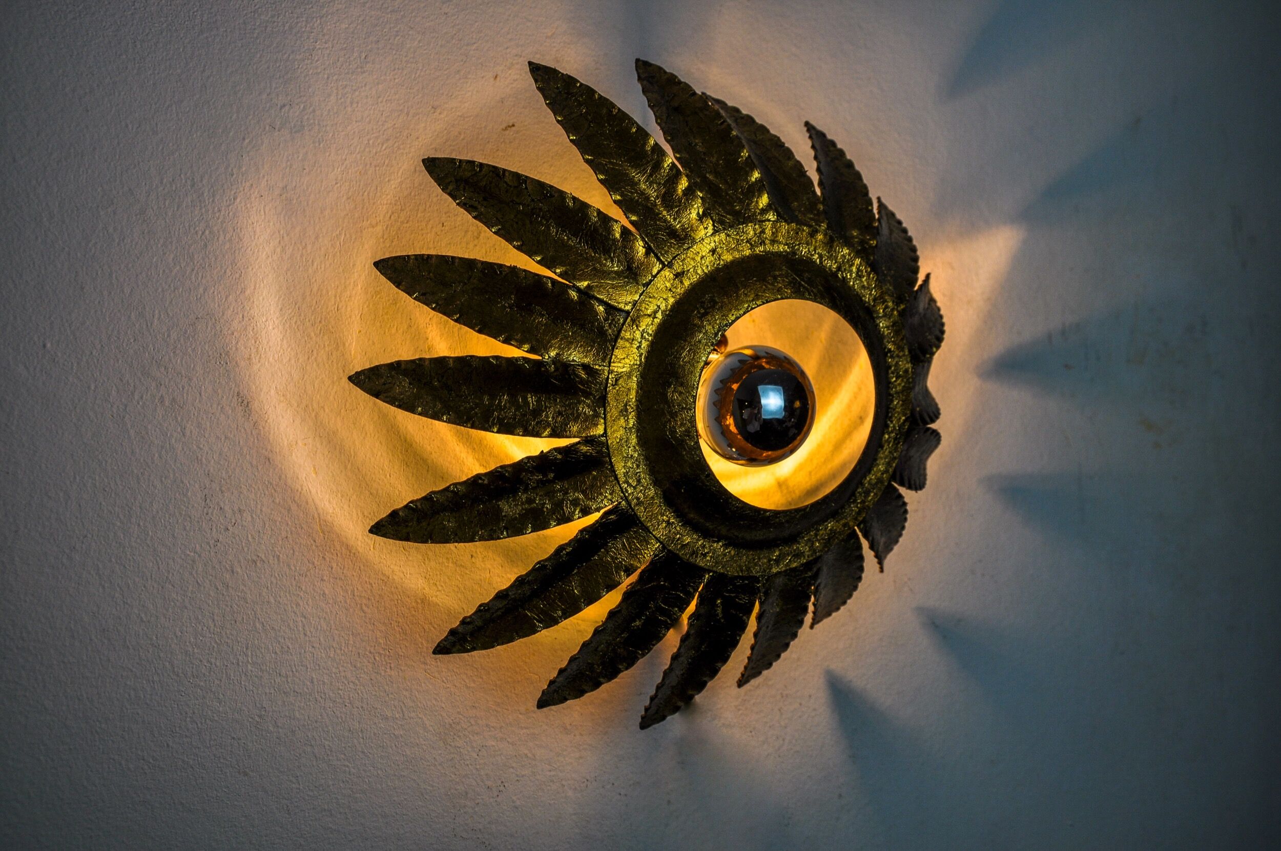 Sun wall lamp by ferro arte, metal and gold leaf, Spain, 1960