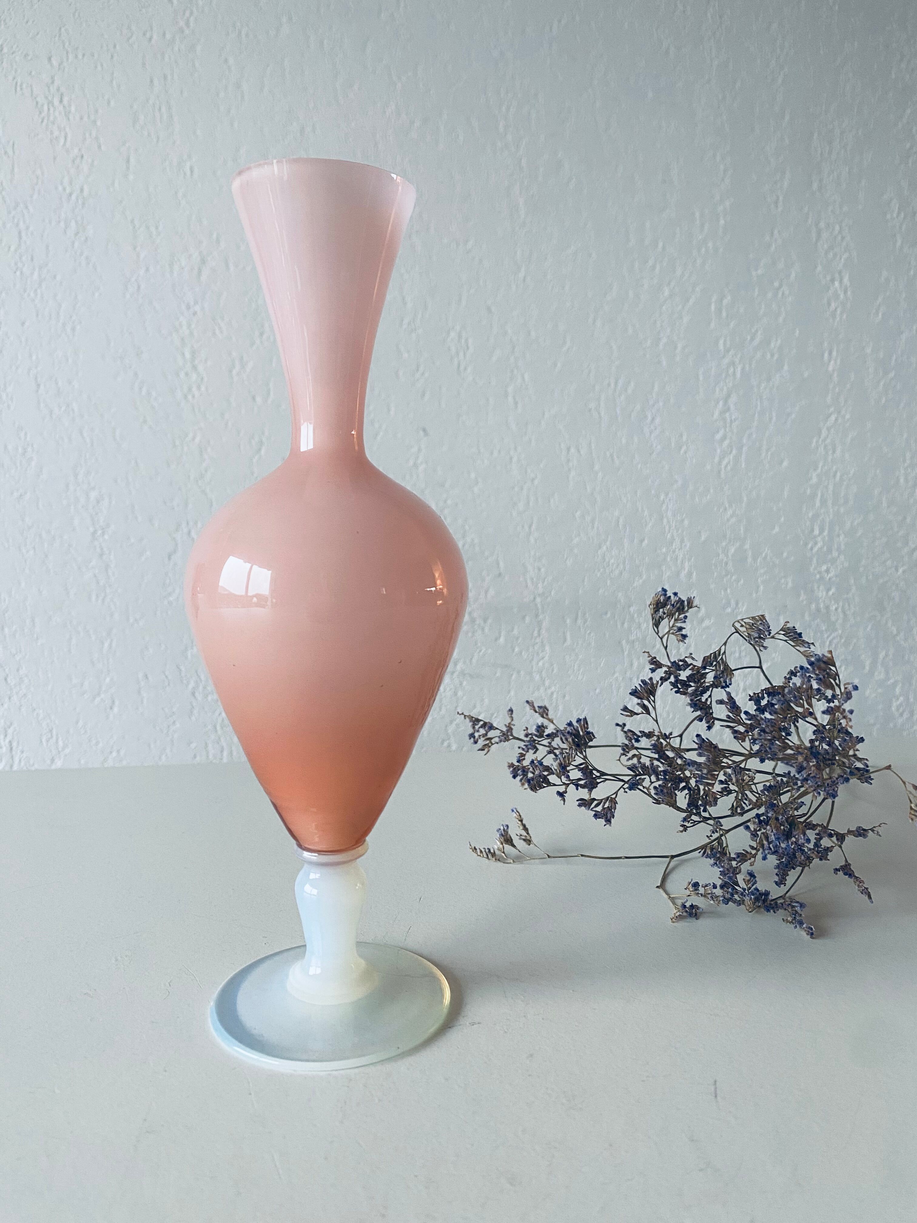 Old vase in pink opaline