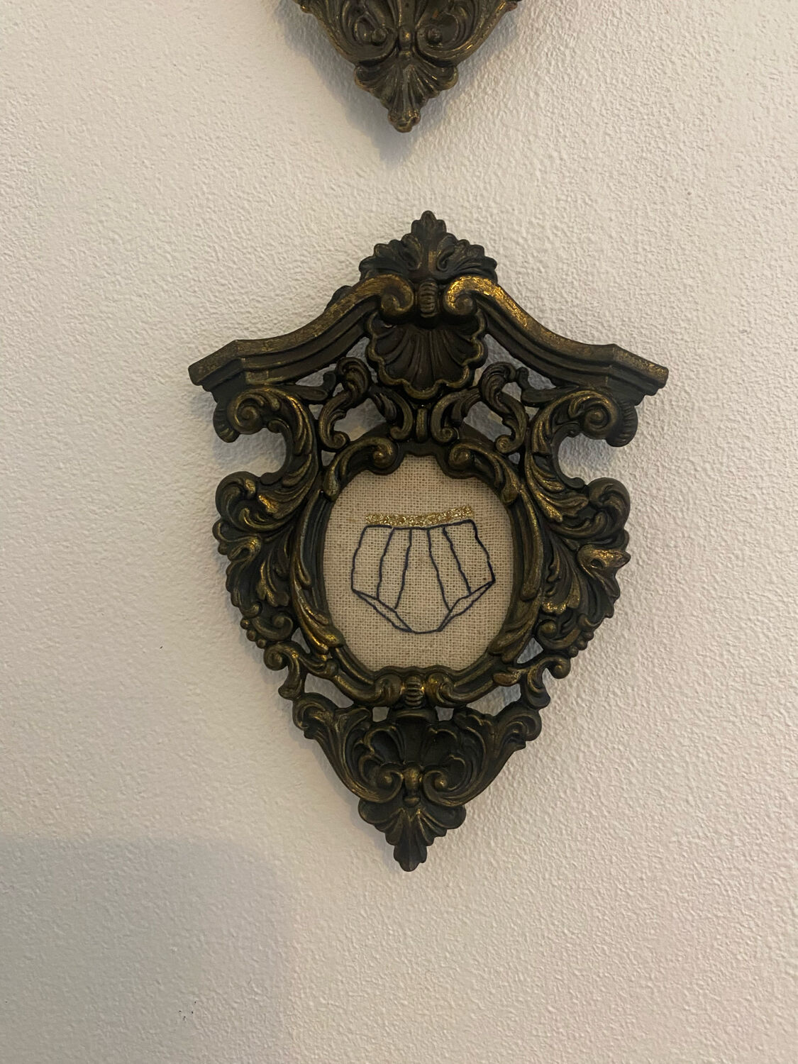 Duo of framed embroidery