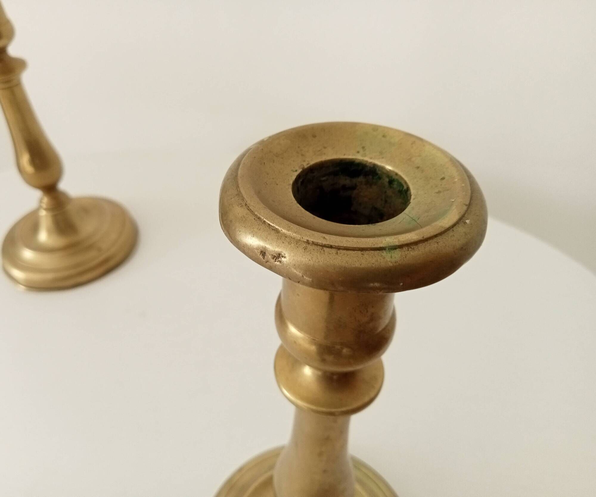 Pair of old candlesticks in solid gilded brass