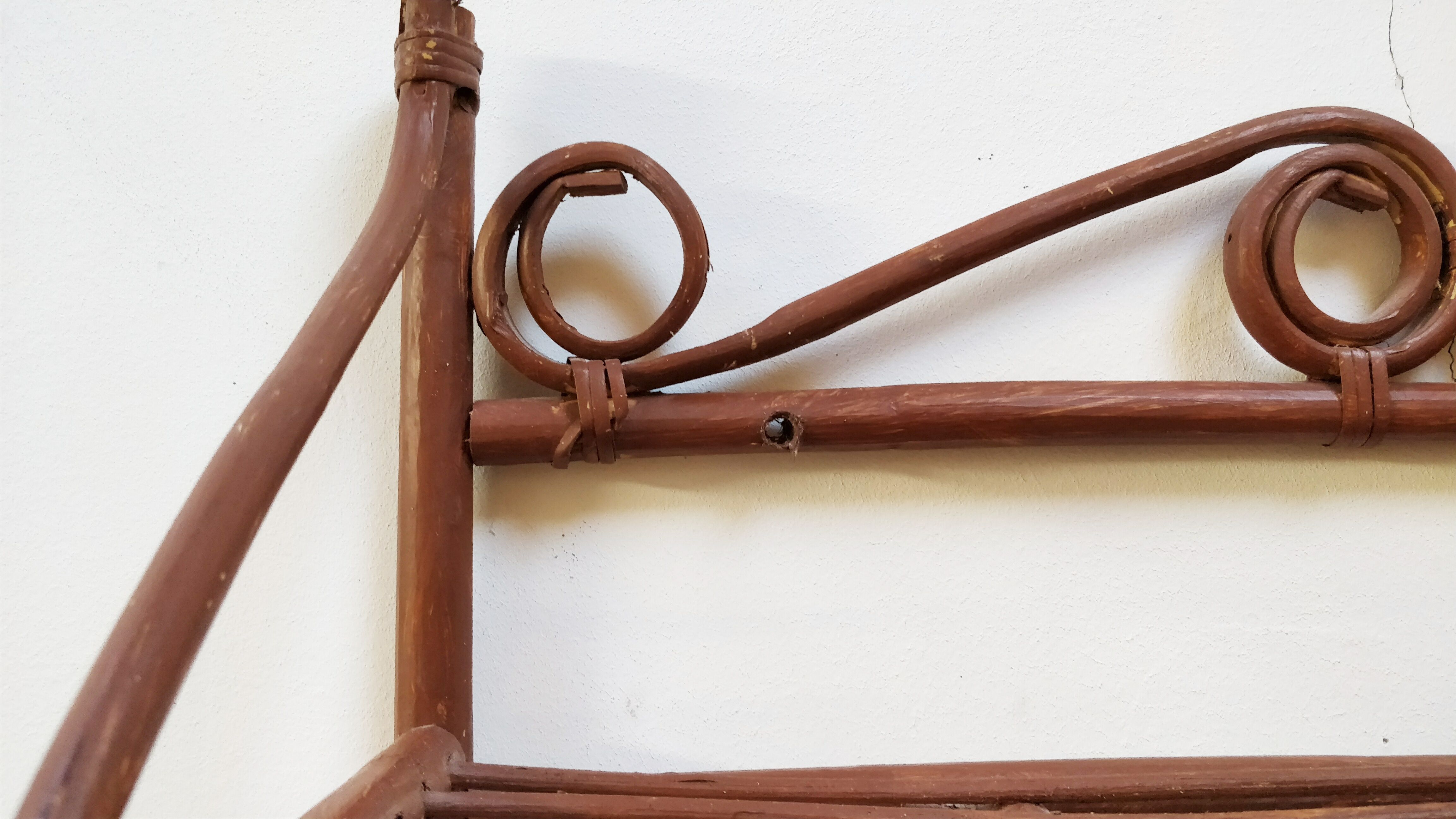 Rattan wall coat rack