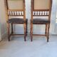 Pair of antique chairs in embossed leather, Henri II style.