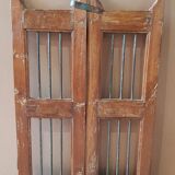 Old Burmese teak gate with openwork wrought iron panels