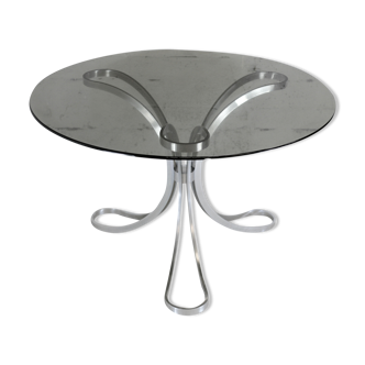 Living room table "Space Age" polished steel, circular slab smoked glass. France, circa 1970.