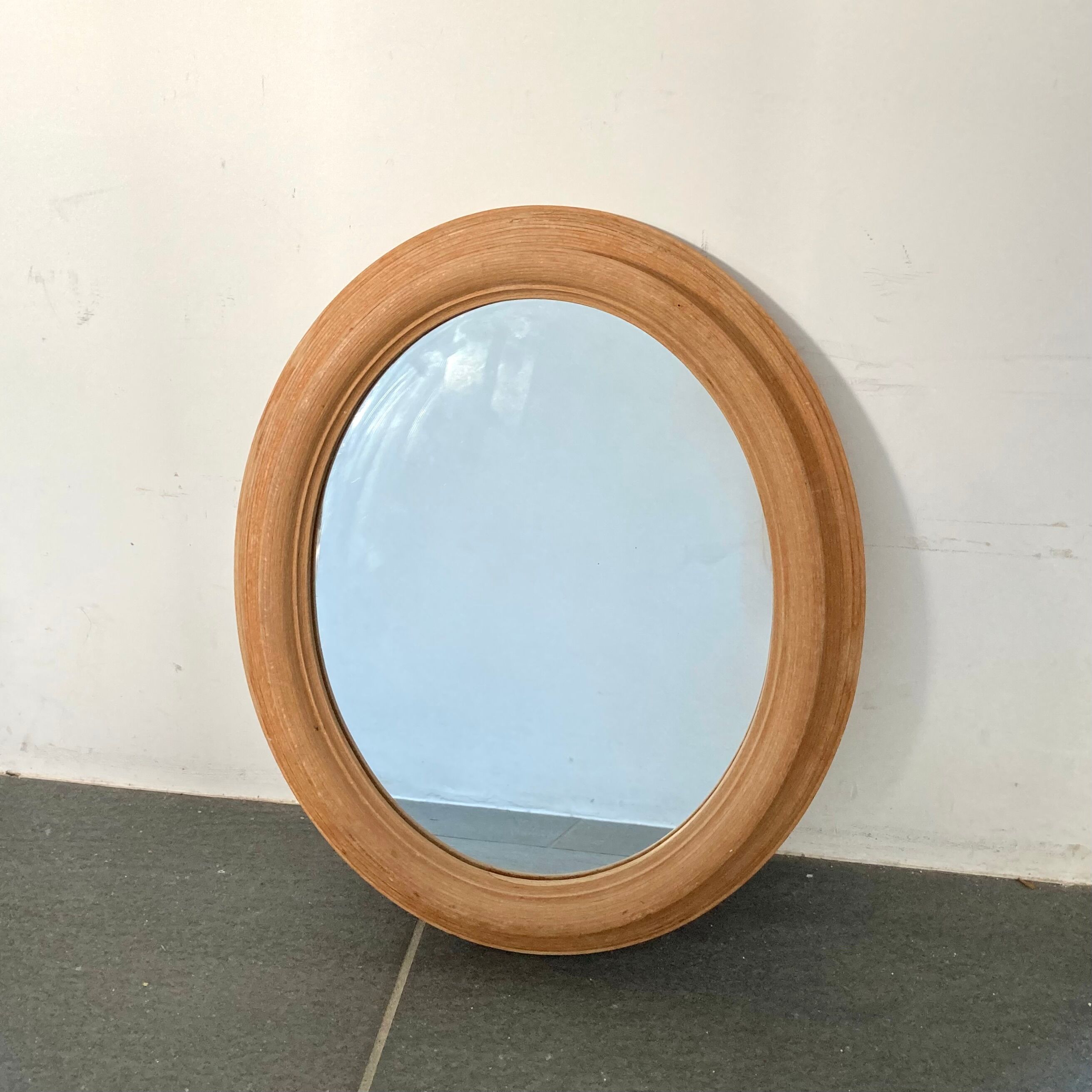 Oval wooden mirror 31x37cm