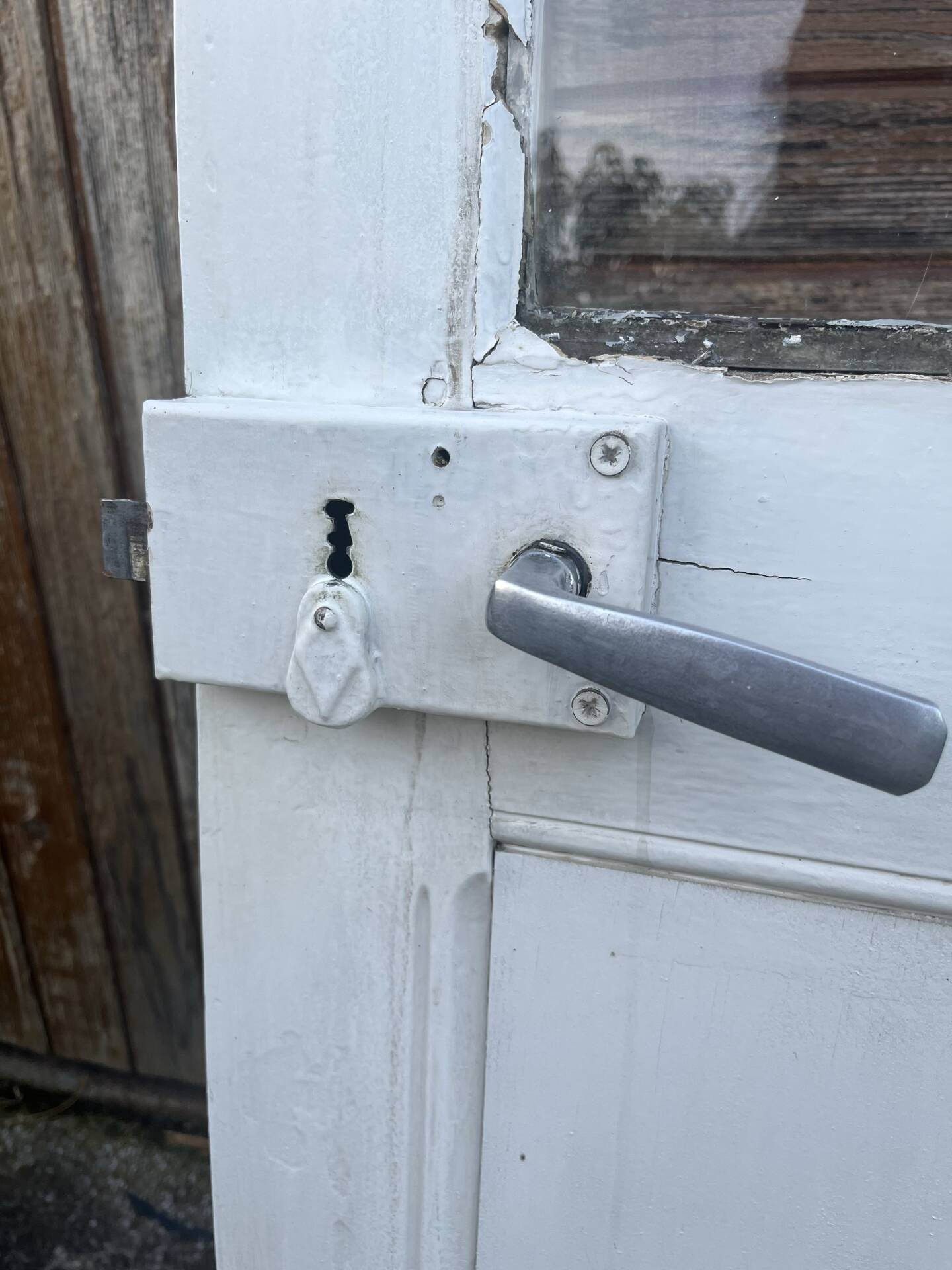 Porte d'entrée ancienne semi-vitrée en bois