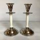 Pair of silver metal candlesticks