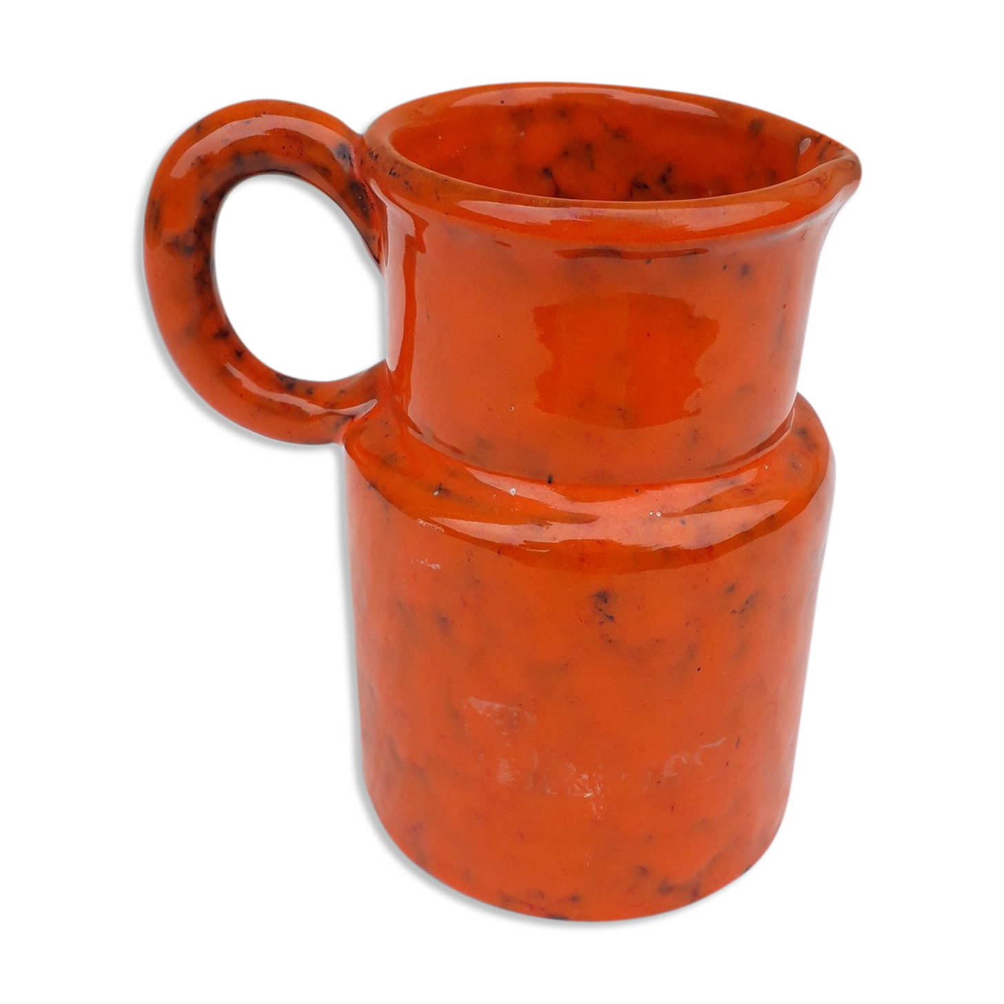 Orange ceramic pitcher