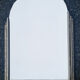 Miroir à suspendre des années 30, art déco, en bois ciselé, miroir biseauté