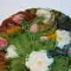 Onnaing dabbling art deco plate strawberries and flowers on leaves