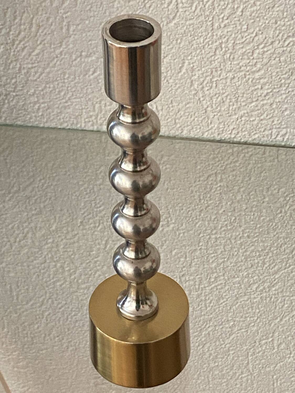 Silver and gold metal candle holder