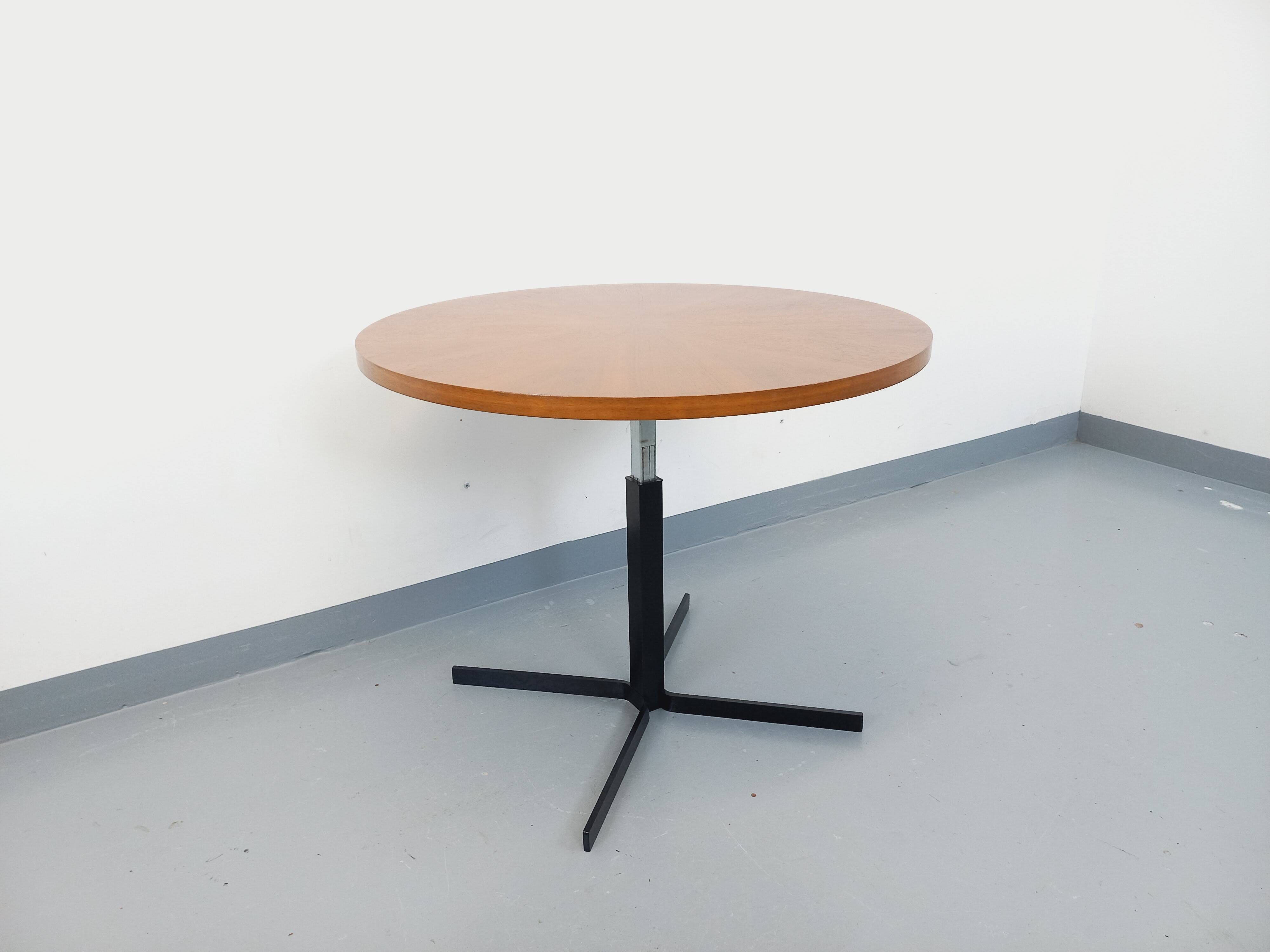 Large round coffee table in vintage Scandinavian style, modular into a table.