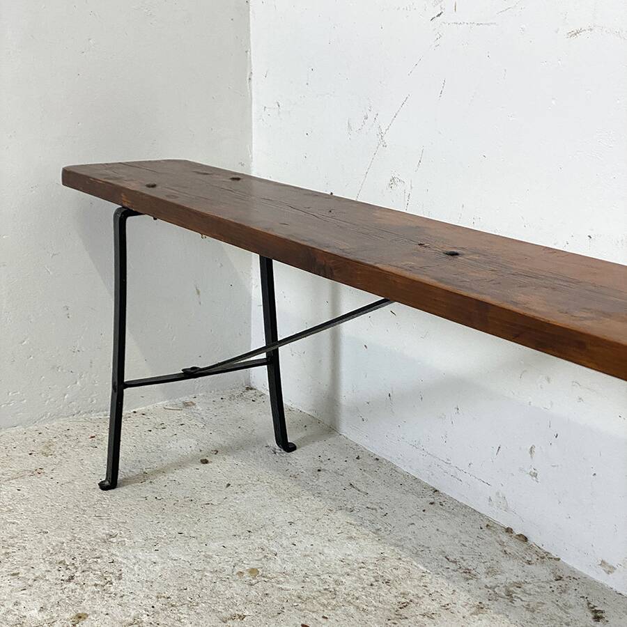 Old wood and wrought iron bench