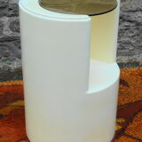 Cylindrical fiberglass bedside table from the 60s