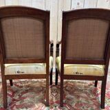Pair of 19th-century armchairs with a scrolled back