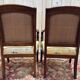 Pair of 19th-century armchairs with a scrolled back