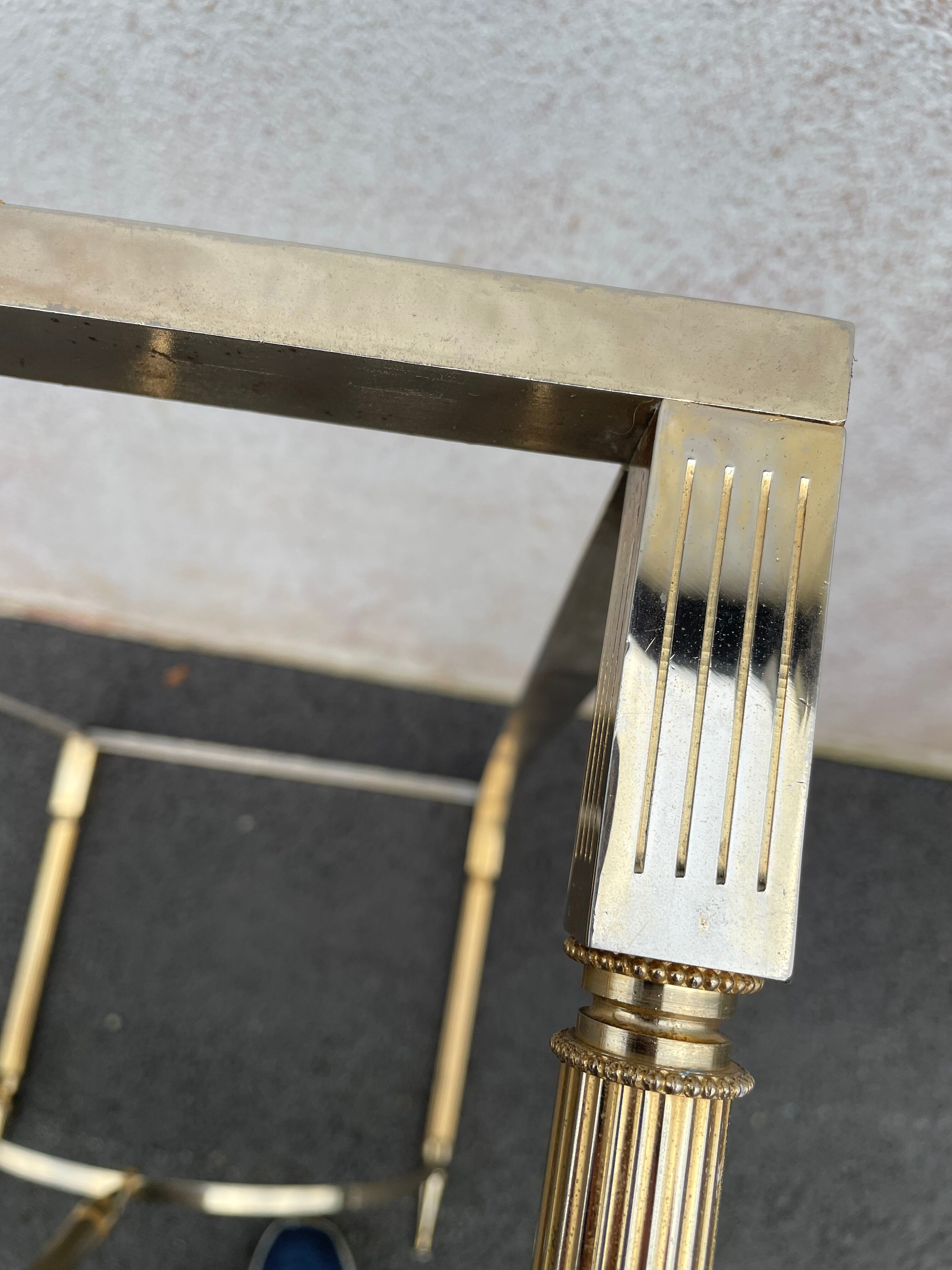 Coffee table in gilded brass and veined green marble