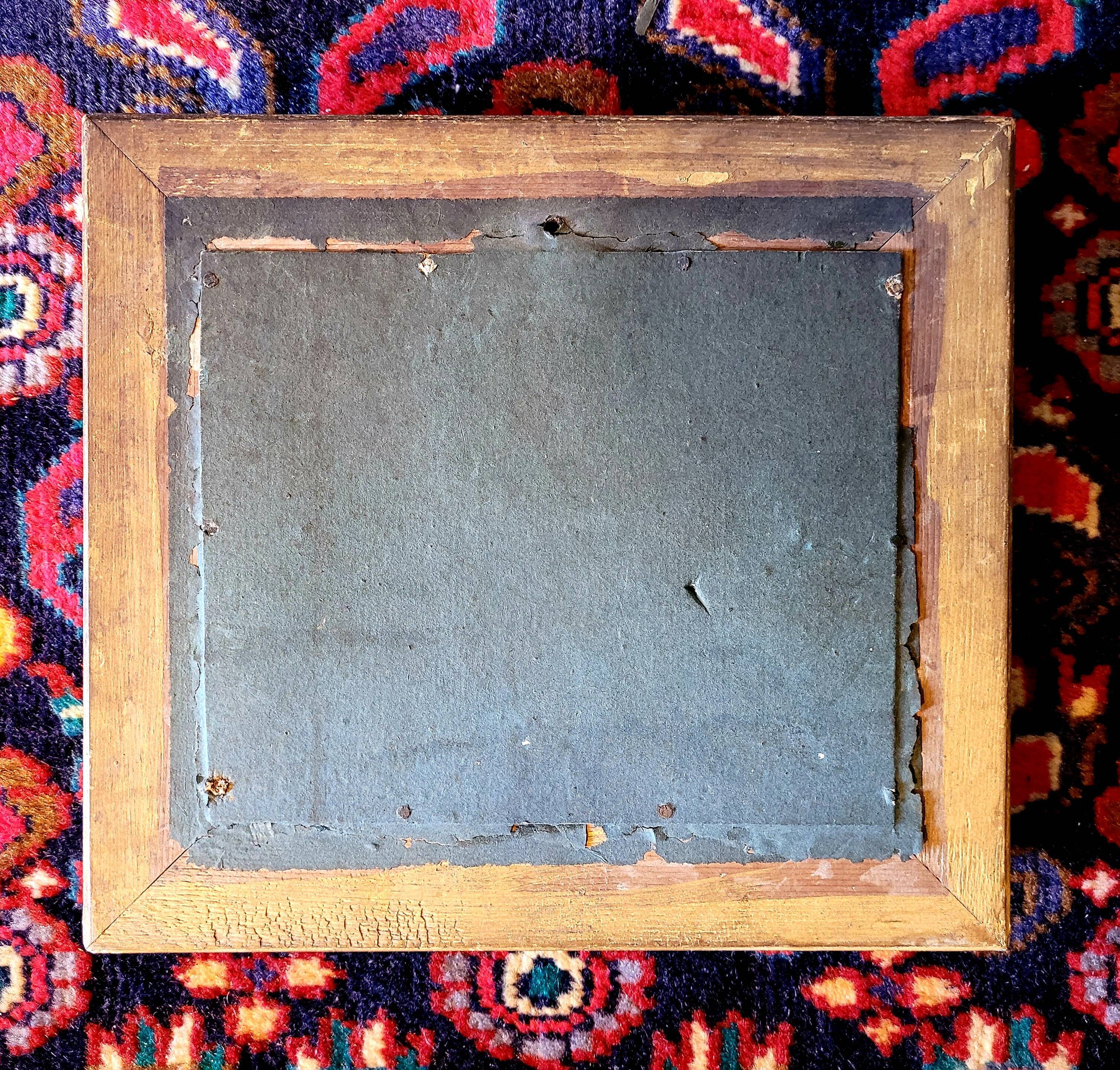 Old painting fixed under nineteenth century glass and vintage gilded frame