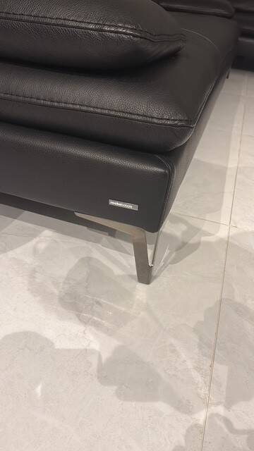 2 black leather sofas roche bobois scenario, one three-seater and one chaise longue.