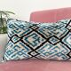 Ikat cushion in blue and black velvet
