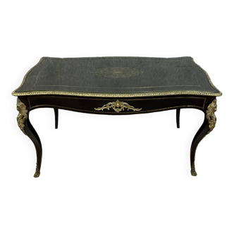 Superb "Boulle" center desk from the Napoleon III period in blackened wood and gilded brass marquetry