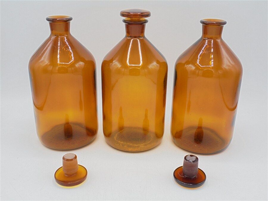 Trio of apothecary bottles