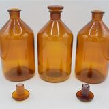 Trio of apothecary bottles