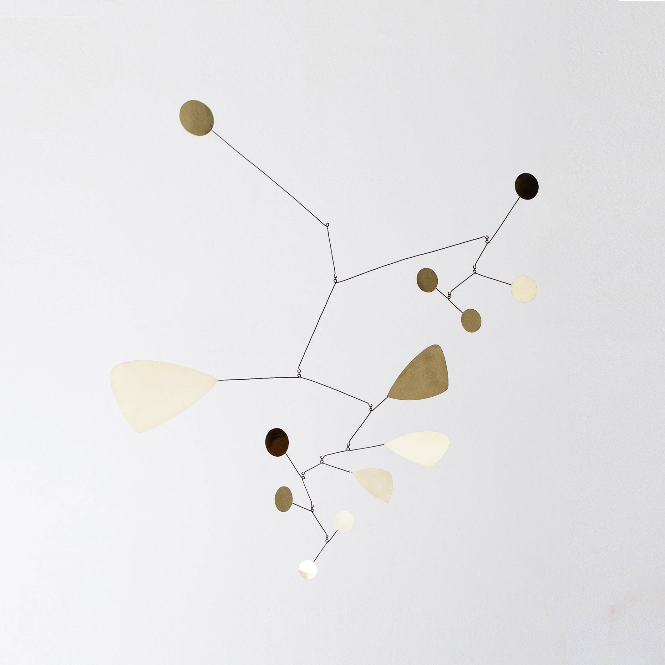 Very large mobile brass sculpture