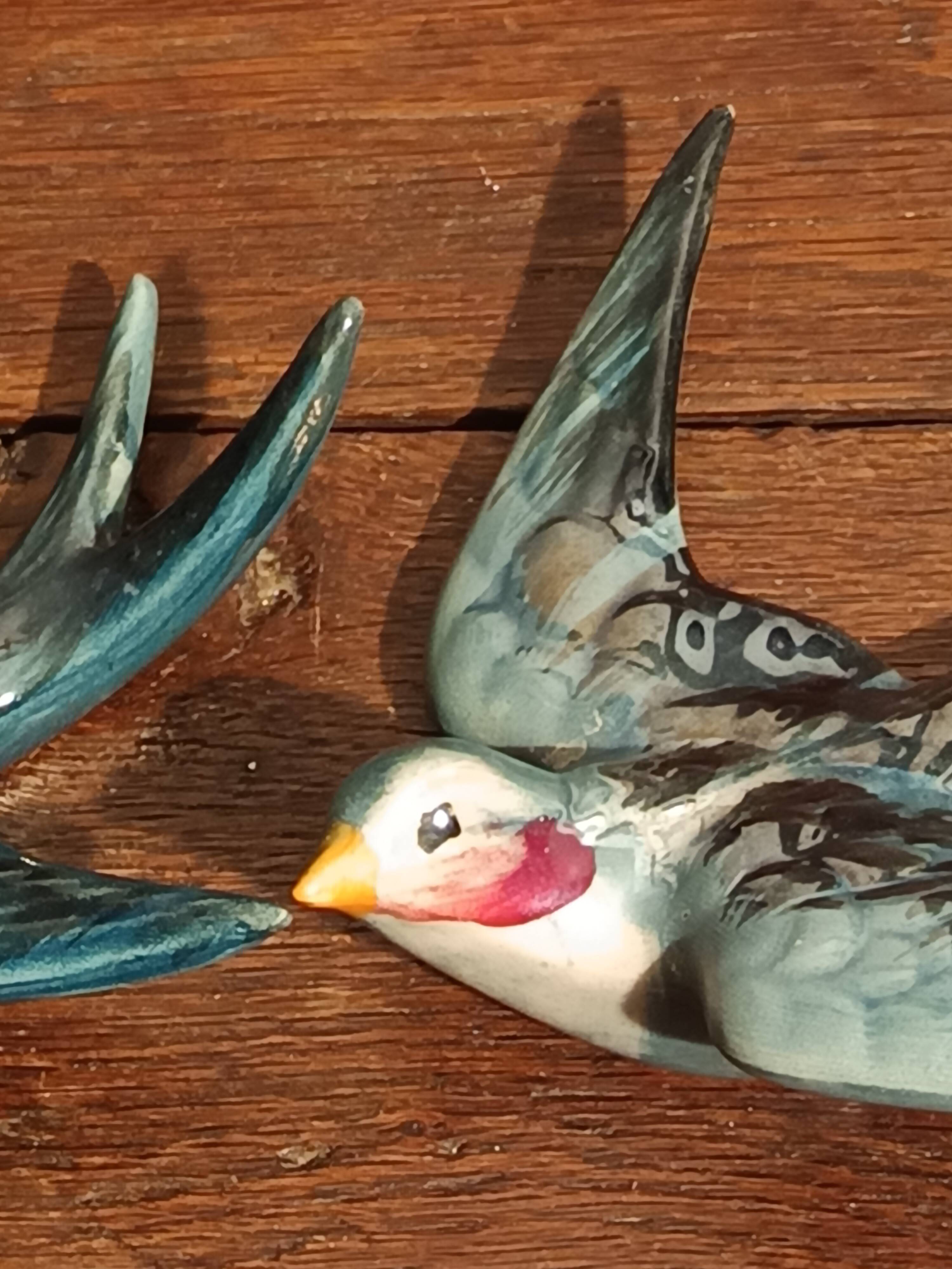 Set of two numbered vintage ceramic wall swallows