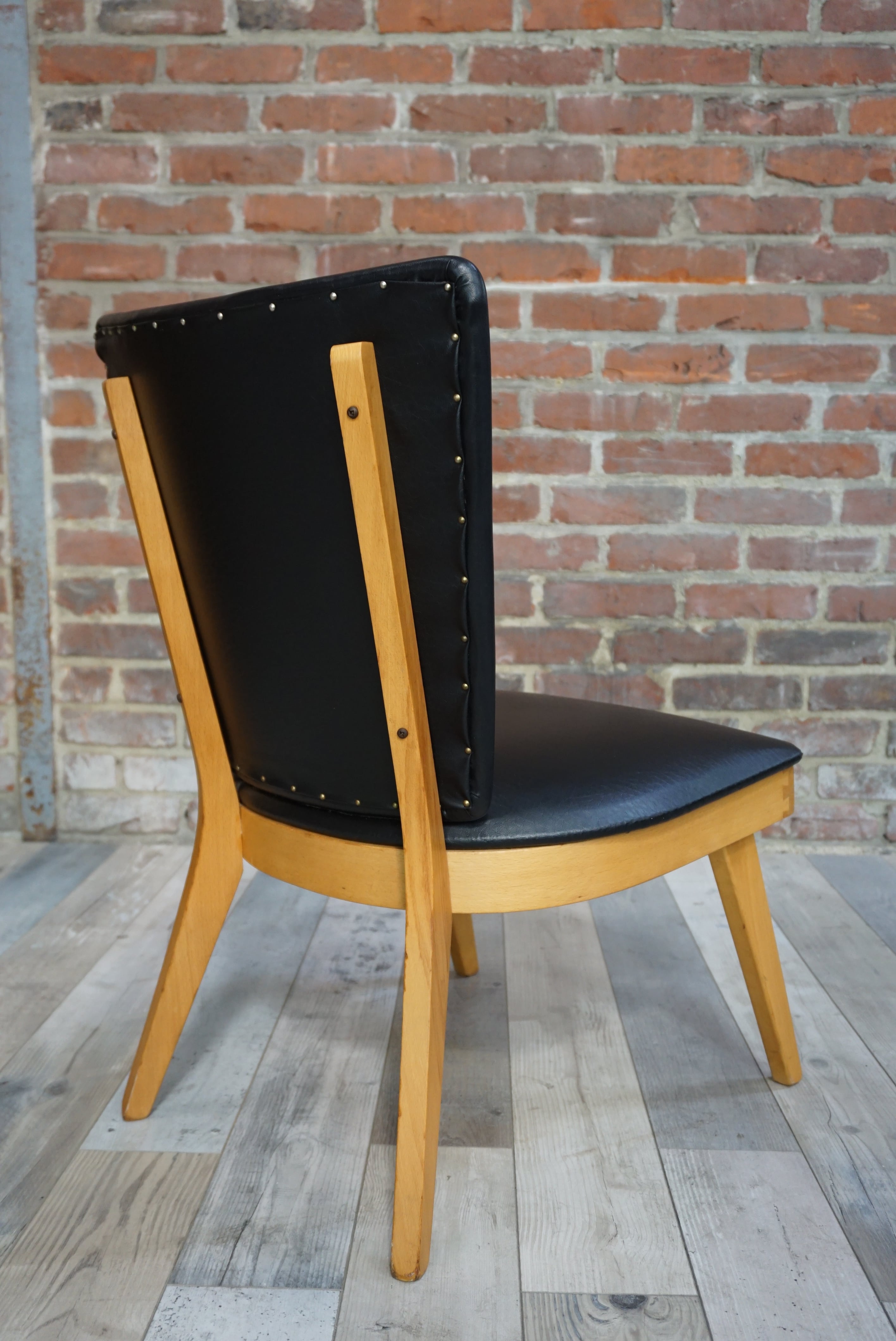 Chair 50 years in wood and faux black leather cocktail
