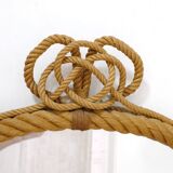 Large oval mirror in rope with pediment, 64cm x 56.5cm.