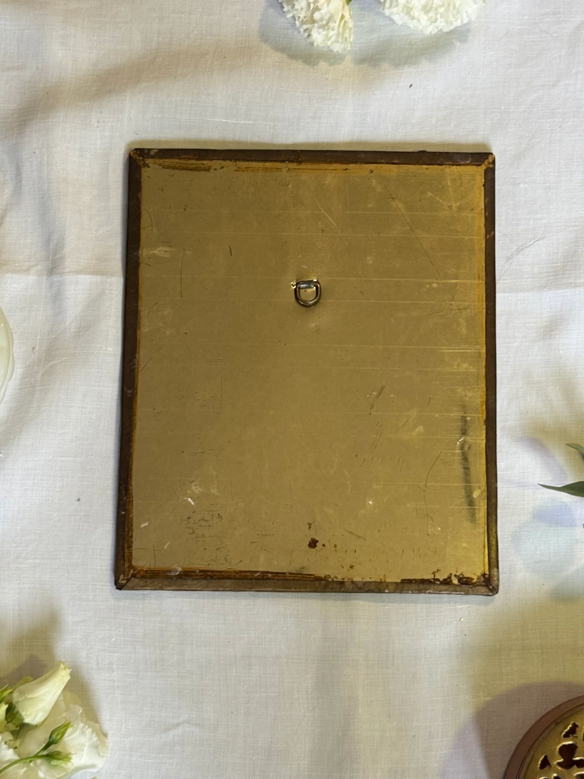 Oriental brass mirror