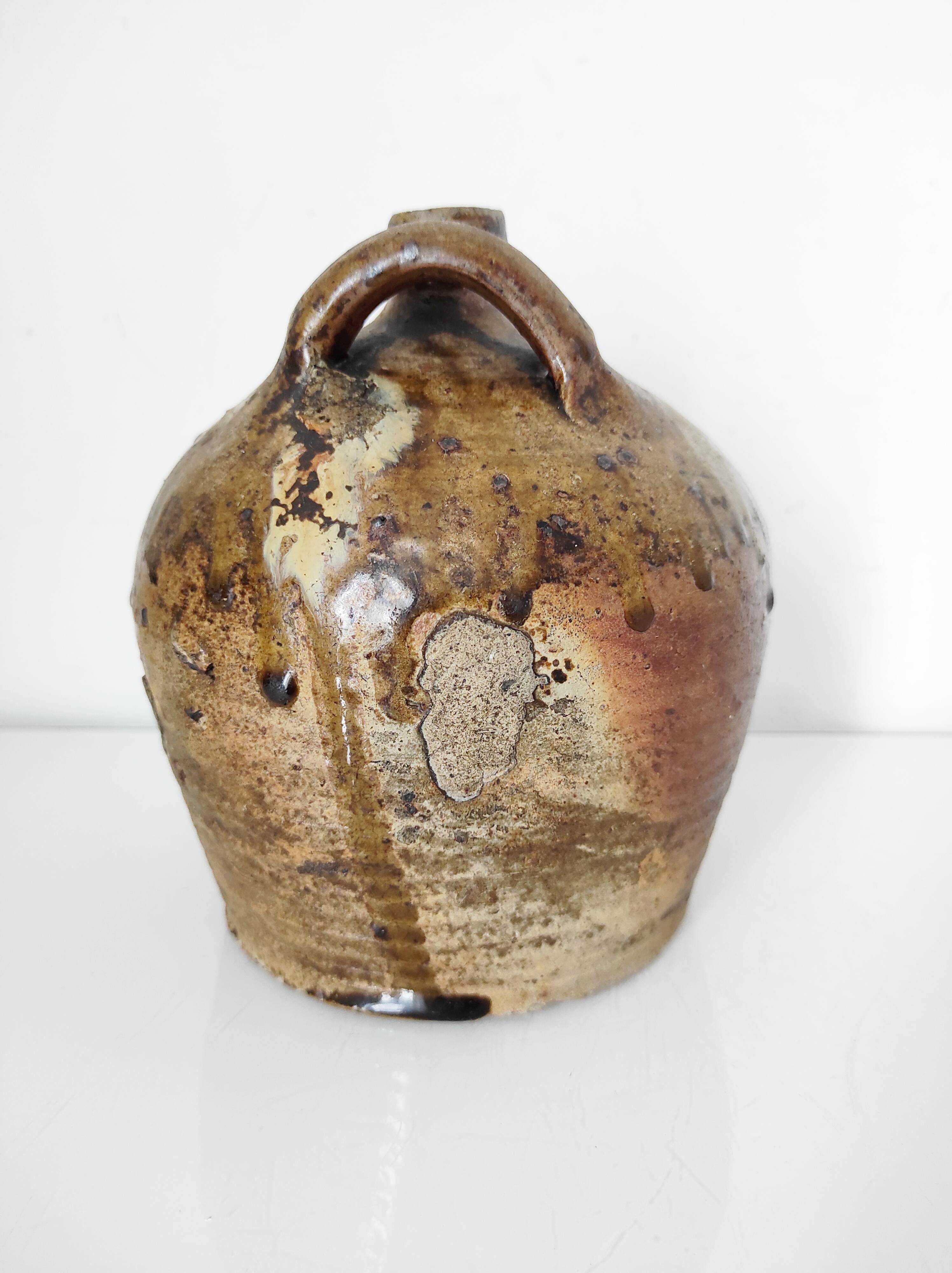 19th century ceramic oil jug