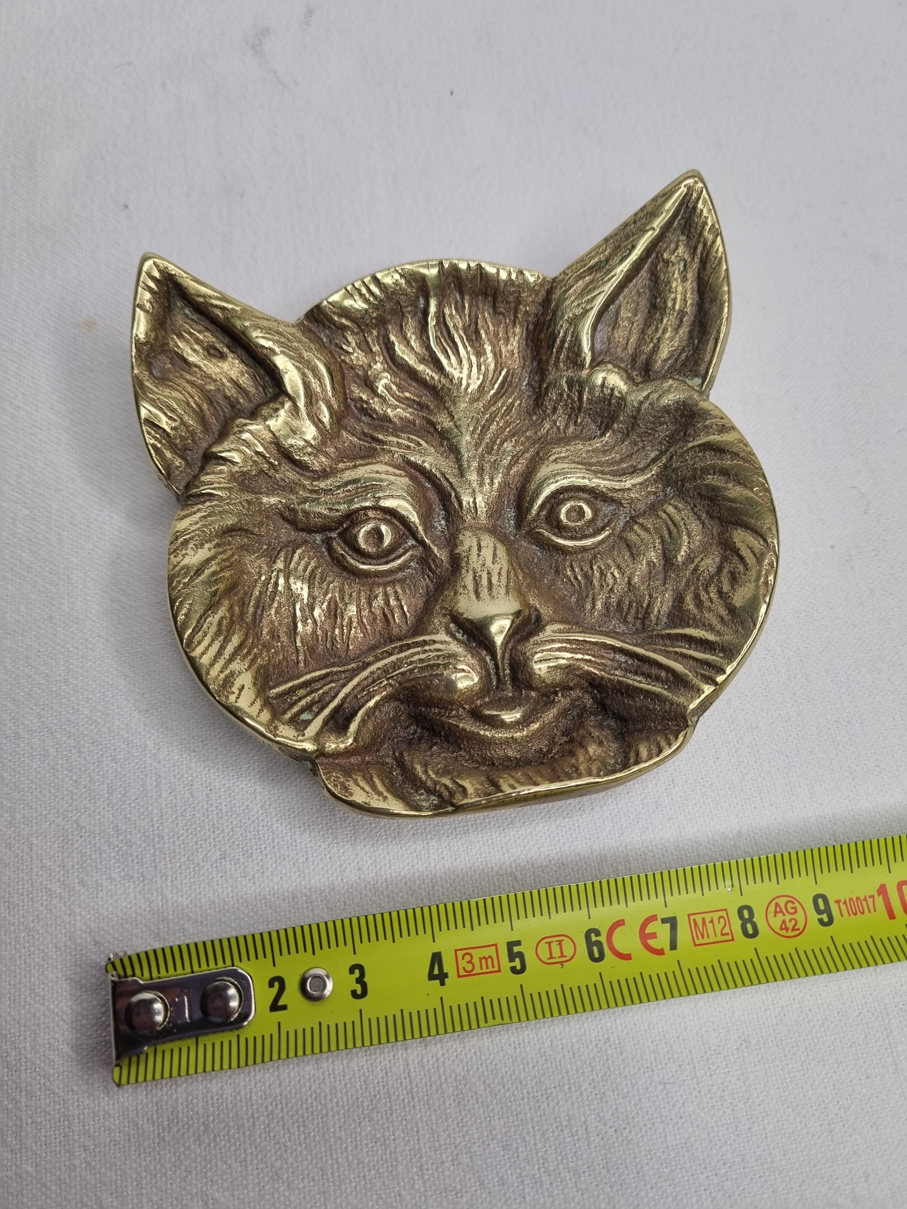 Massive brass cat head paper press