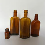 Lot de 4 bouteilles anciennes
