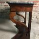 Console era restoration in mahogany veneer with St. Anne marble top.