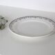 Round dish and flat Terre de Fer, Saint Amandinoise, 1930
