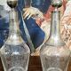 Pair of antique crystal and solid silver decanters.