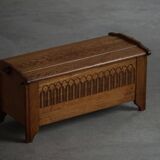 Modern Danish oak commode with decorative relief sculpture, mid-20th century.